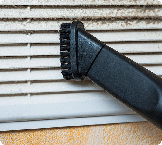 A close up of the brush on an air conditioner